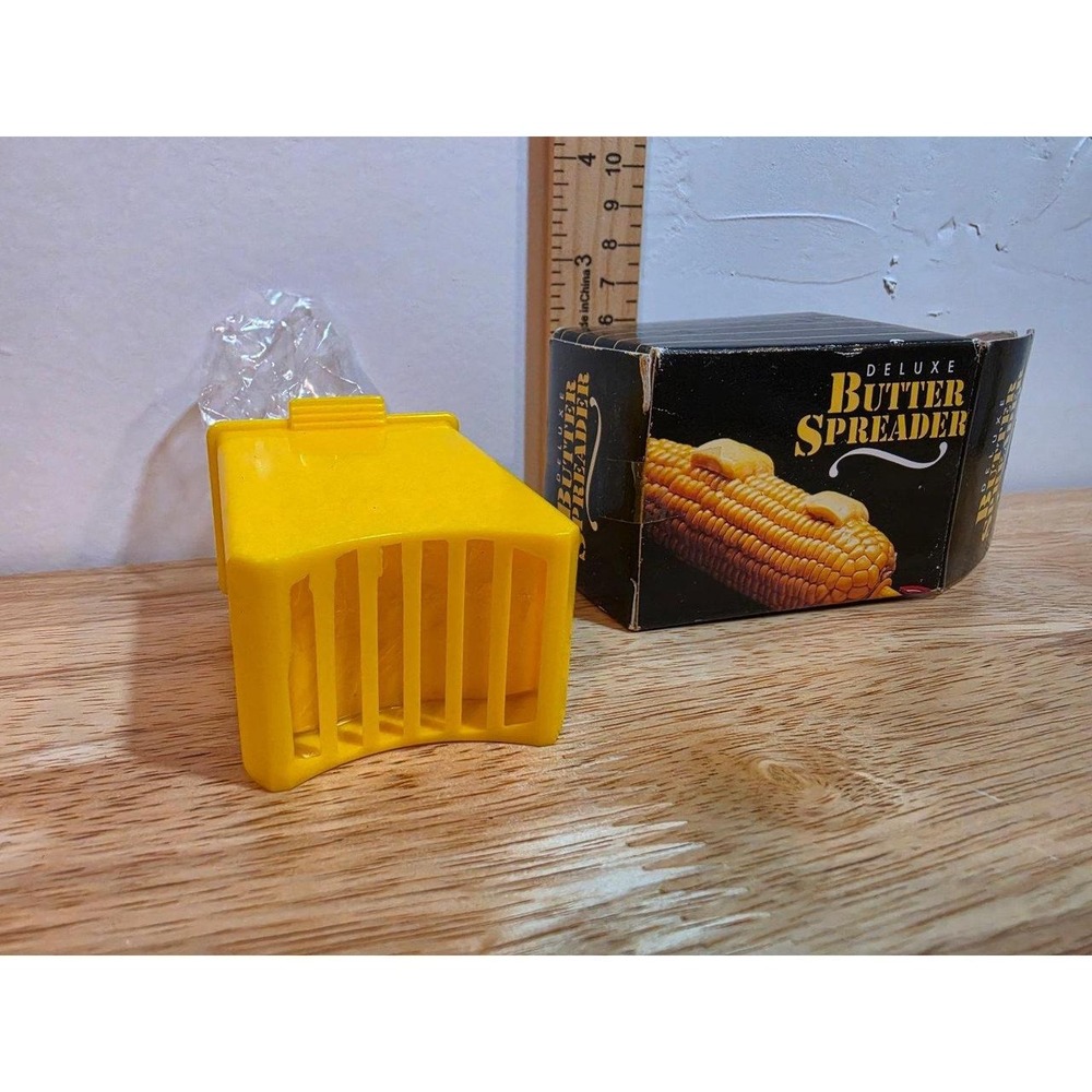 Vintage Deluxe Butter Spreader, which is a classic kitchen gadget